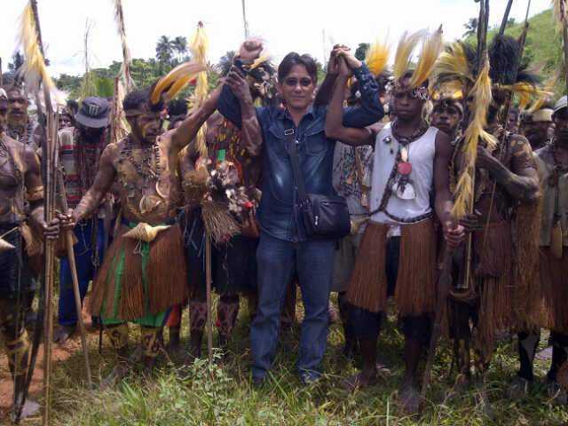 Dessy Mulvidas with Boven Digoel villagers in April 2013.