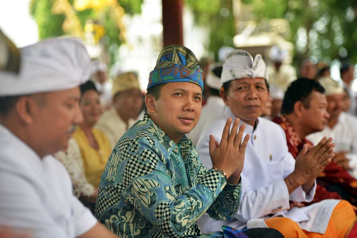Muhammad Ridho Ficardo dons Balinese clothing for a Hindu ceremony in Lampung.