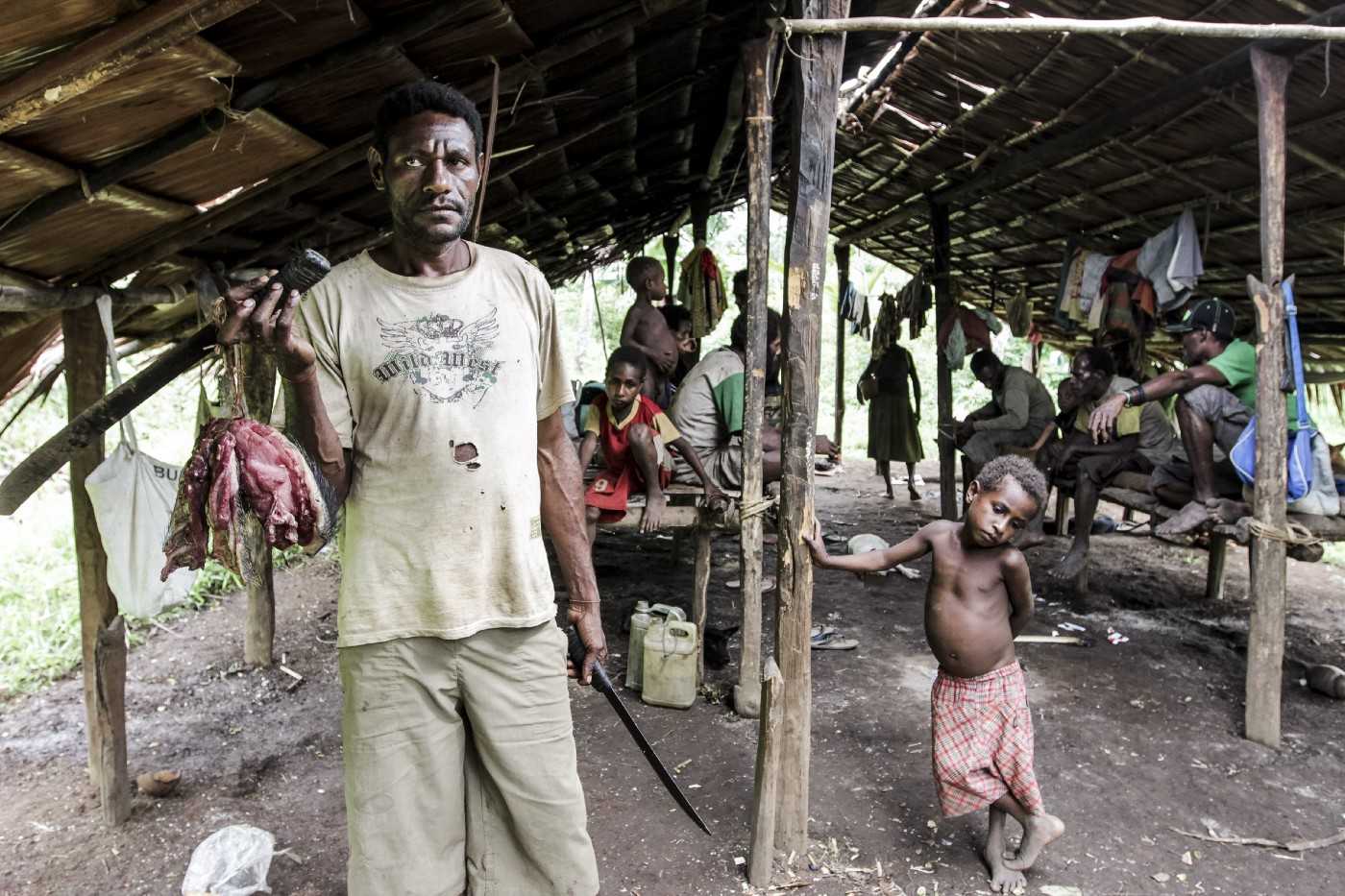 Hunter-gatherer family in Merauke, 2012.
