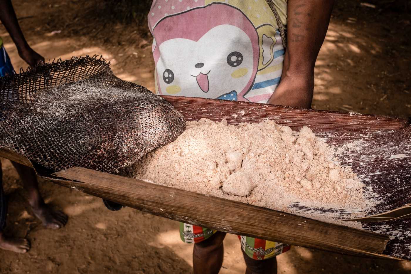 Sago flour, produced by pounding of sago palm stems.