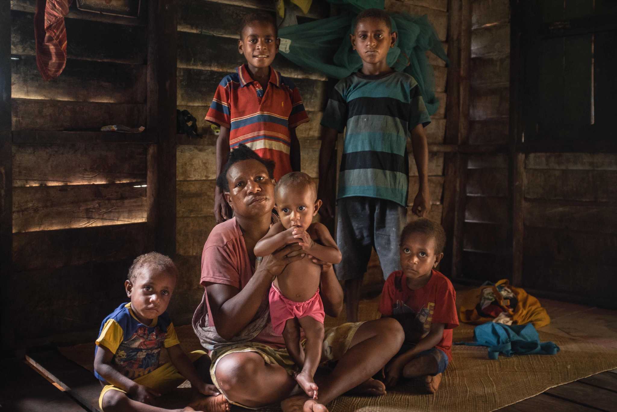 Photo of Natalia Mahuze and her five sons. Two of them were malnourished as of April 2022.